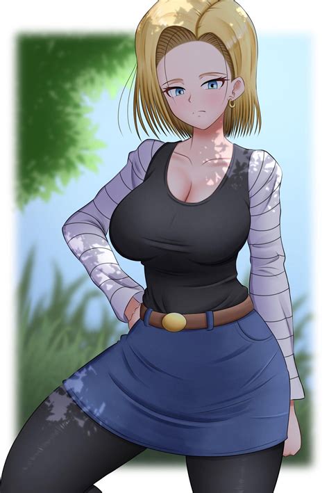 a woman with blonde hair and blue dress posing for the camera in front