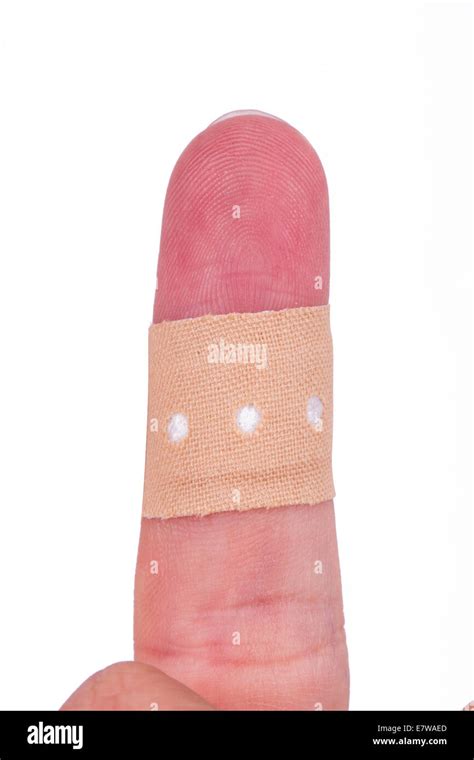 close  view  adhesive bandage plaster  index finger isolated