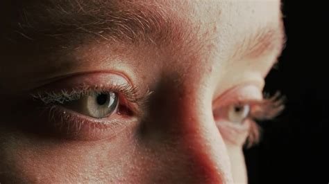 Woman Opening Her Eyes Slowly - Stock Video | Motion Array