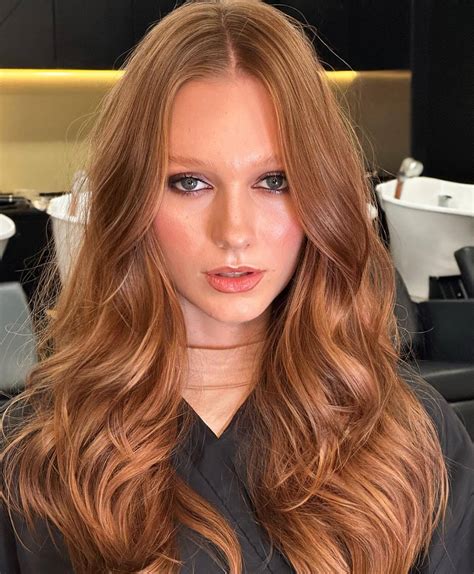 Discover the perfect strawberry blonde hair shades for your skin tone 26