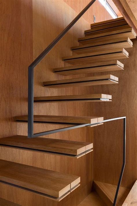 minimalist staircase with a metal handrail and no balustrade | Modern stairs, Diy staircase ...