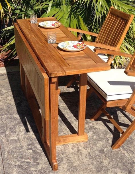 teak wood hatteras rectangular folding patio table     outdoor dining table folding
