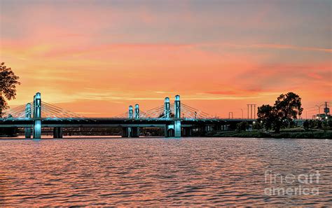brazos river bridge sunset glow photograph  bee creek photography
