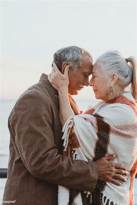 Romantic senior couple by the pier | premium image by rawpixel.com