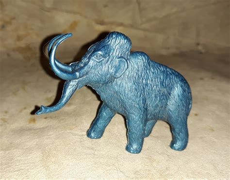 mpc prehistoric animals macrauchenia  woolly mammoth collectors weekly