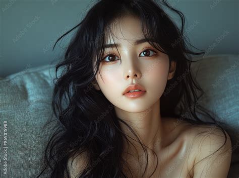 Portrait of pretty young Korean, Japanese, Chinese woman, girl sitting