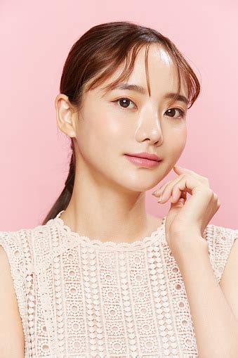 Beauty Portrait Of Young Asian Woman In Dress On Pink Background Stock ...