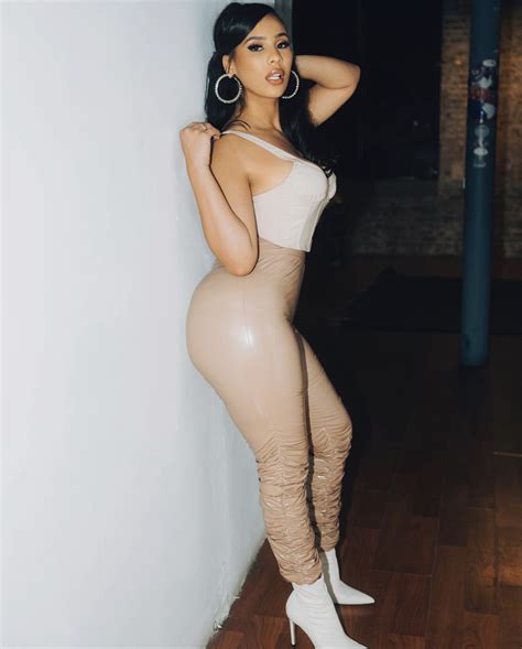 Cyn Santana Posed in Nude Latex Stacked Pants by Fashion Nova - Fashion