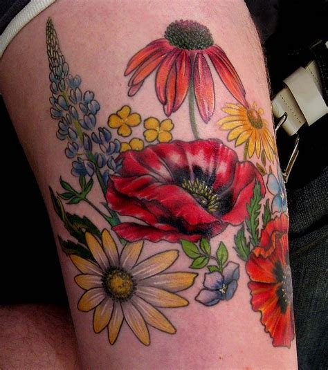 Coloured flowers tattoo for women - Tattooimages.biz
