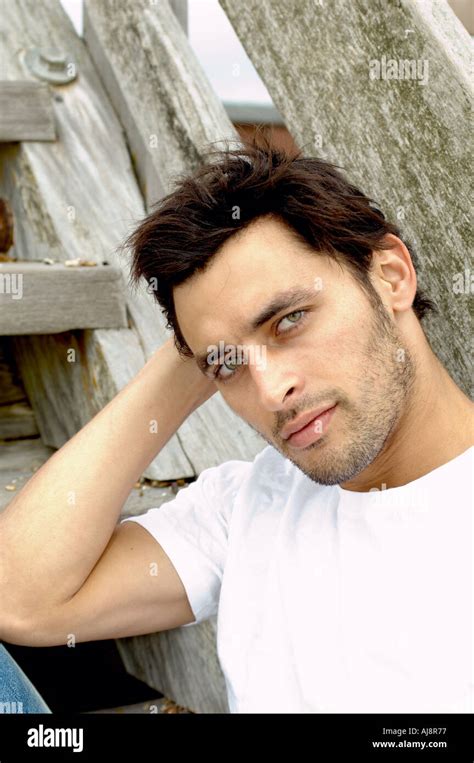 handsome man glaring at the camera Stock Photo - Alamy