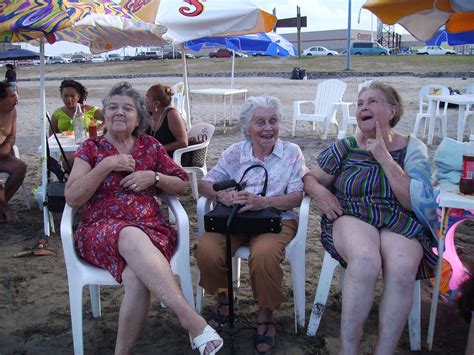 My late grandma (middle) and her sisters having fun at the beach : r