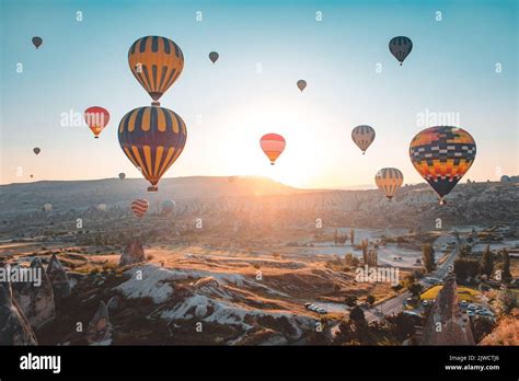 cappadocia sunrise hot air balloons fly  goreme valley landscape