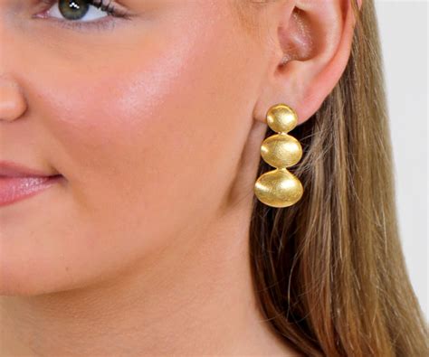 taylah gold statement earrings