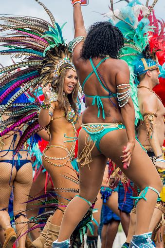 People Wearing Costumes Dancing At The Sambadrome During The Carnival ...