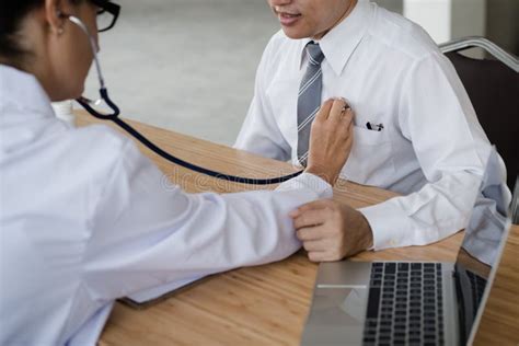 The Hand of the Doctor Examining a Patient with Stethoscope in M Stock ...