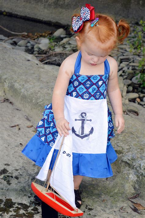 My daughter Maddison Rose in a sailor dress that was made by Corrina