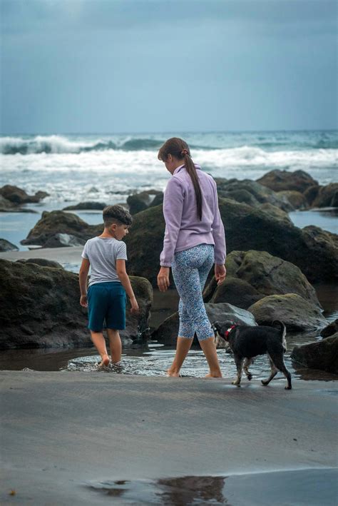 Mother And Son Walking On The Beach Photos, Download The BEST Free