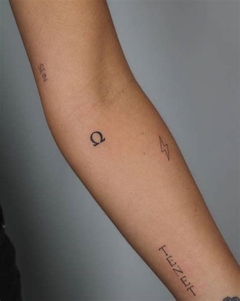 Alpha And Omega Symbols Tattoos