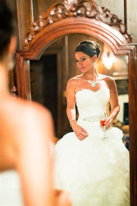Bride Getting Ready in Strapless, Drop Waist, Ball Gown Wedding Dress