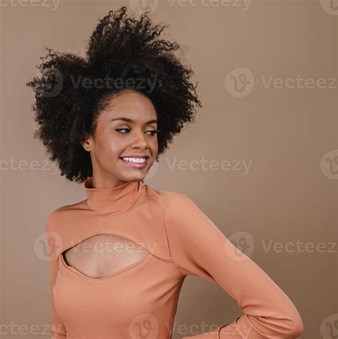 Closeup of a smiling young Latin afro woman. Joy, positive and love