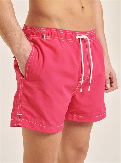 Plain-coloured swimming costume with embroidery and back pocket