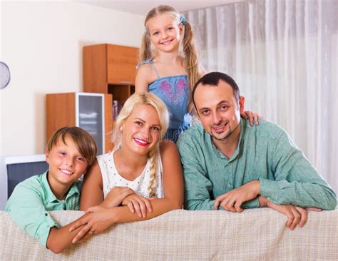 Smiling Family with Two Kids Stock Image - Image of interior, happiness ...