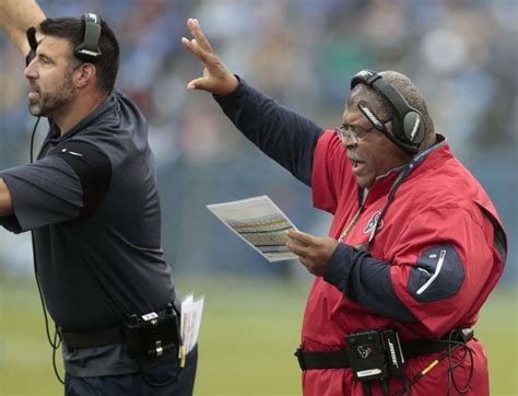 Texans' Romeo Crennel not ready to flash Super Bowl rings yet