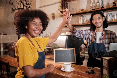 Two cafe business startup partners and friends, African American female