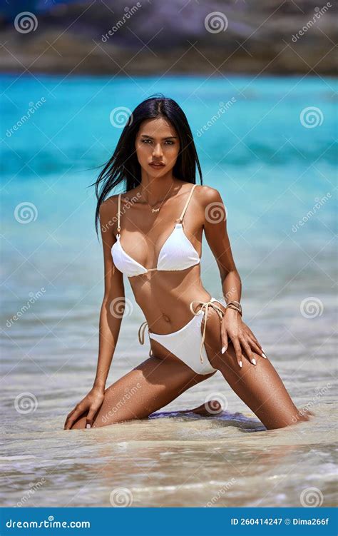 Girl in White Bikini Posing at the Tropical Beach Stock Image - Image