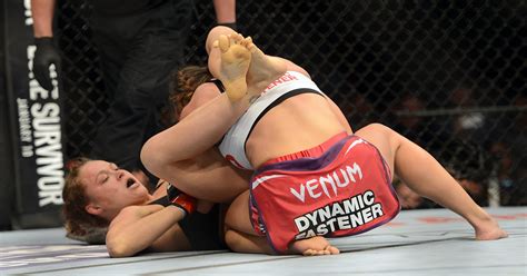 Ronda Rousey submits Miesha Tate by 3rd-round armbar