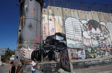 Graffiti artist paints memes on West Bank wall - Israel Culture - The Jerusalem Post