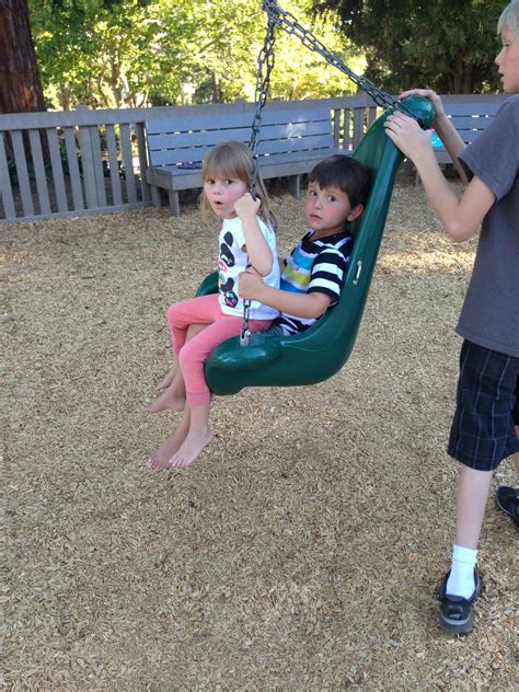 Sometimes my son can be so sweet to his sister, letting her sit on his