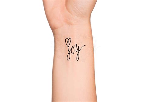 hand with heart tattoo 7