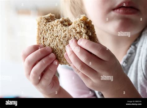 Child eating peanut butter sandwich hi-res stock photography and images ...