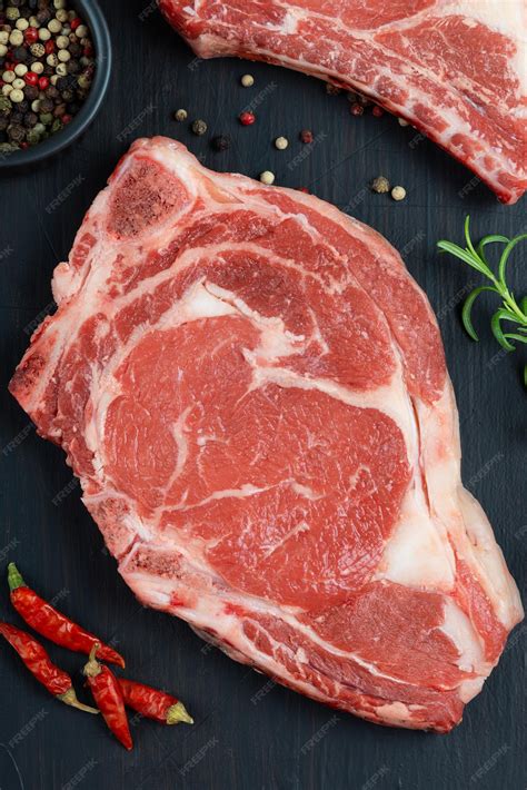 Premium Photo | Raw meat beef steak black angus prime meat set ribeye