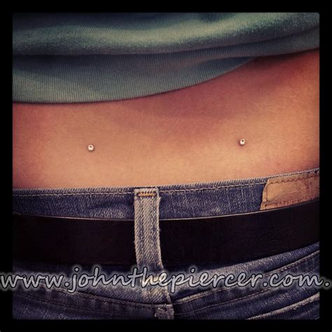 Back Dimple Dermals | Back dimple piercings, Back dimple, Dimple piercing