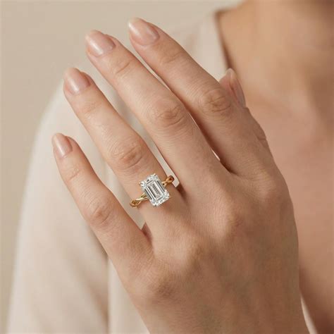 twisted engagement ring emerald cut 9