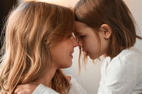 premium photo side view embracing   mother