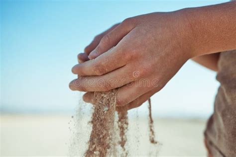 dropping sand  hands stock photo image  falling horizontal