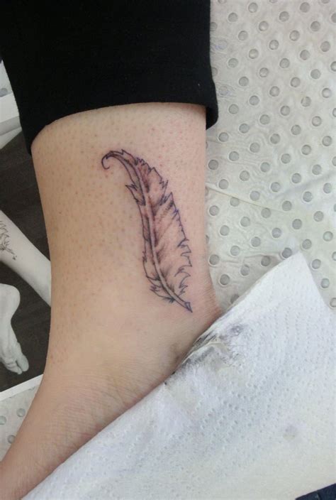 75 Amazing Feather Tattoo Design - Mens Craze