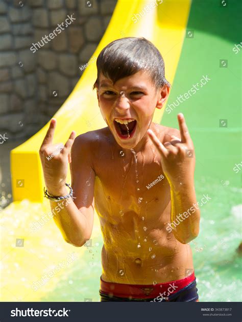 Screaming Child On Water Slide Amusement Stock Photo 343873817 ...