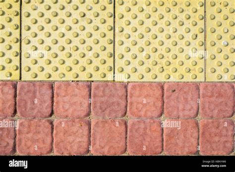 tactile paving slabs texture blind waytraffic route  blind