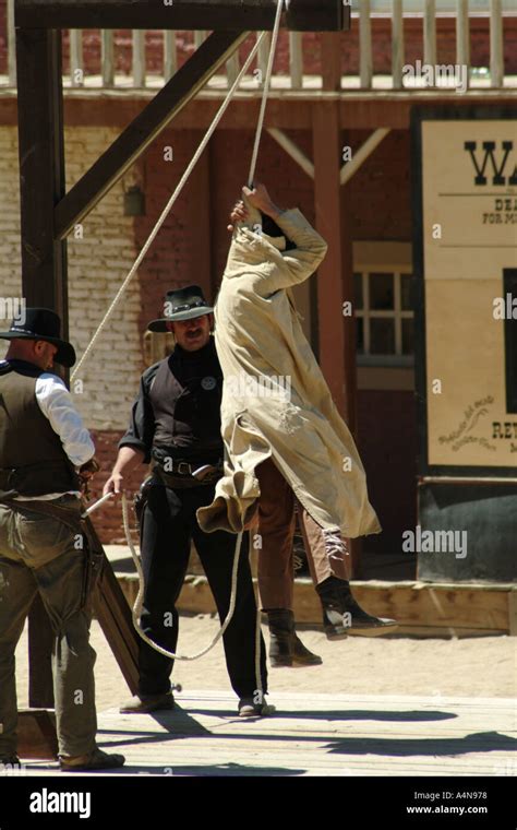 man hanging in gallows at a film set recreation of a hanging Stock ...