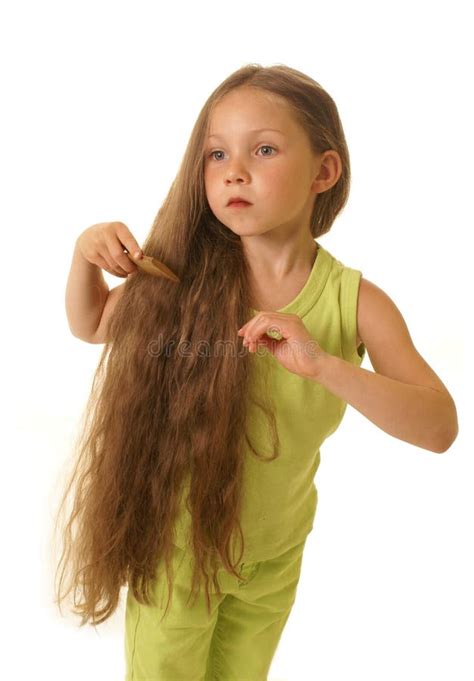 pretty girl combing  hair stock photo image  comb brush