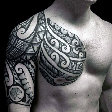 Incredible black and white tribal ornaments tattoo on chest and ...