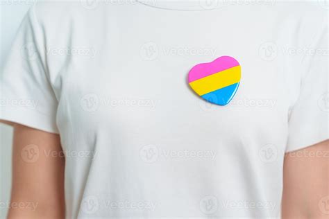 Pansexual Pride Day and LGBT pride month concept. hand holding pink