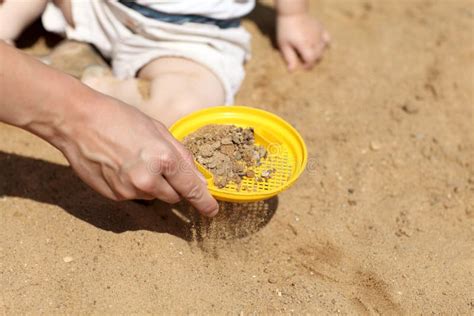 Sieving Sand stock image. Image of timepassing, sand, time - 5359323