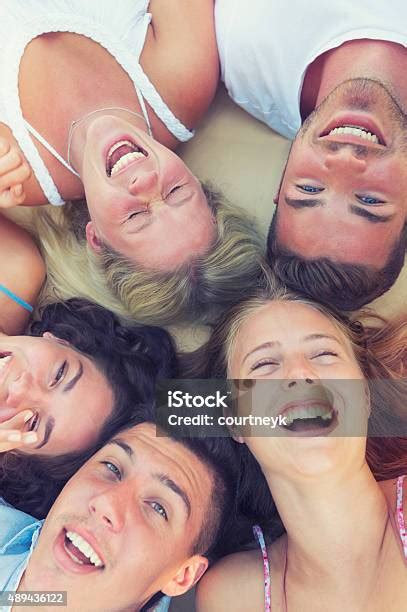 Group Of Young People Lying Down In A Circle Stock Photo - Download ...