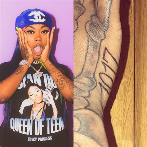 Asian Doll Number Side of Hand Tattoo | Steal Her Style