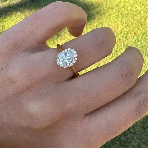 oval halo diamond   plain band engagement ring temple grace nz